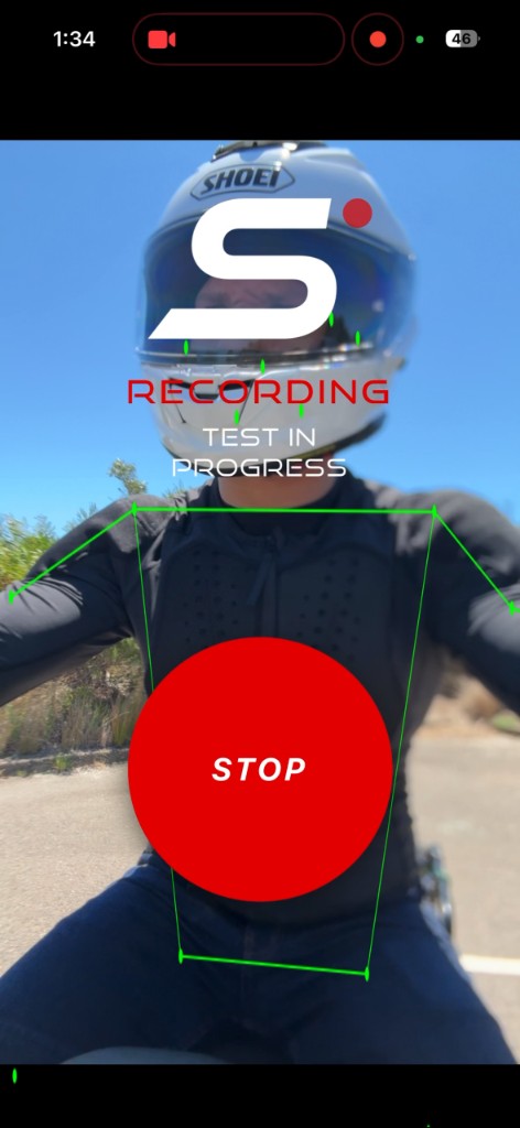 Savvy Rider app recording a real motorcyclist with AI body tracking overlay